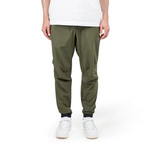 New Balance Fortitech Woven Pants (Grün) - Allike Store