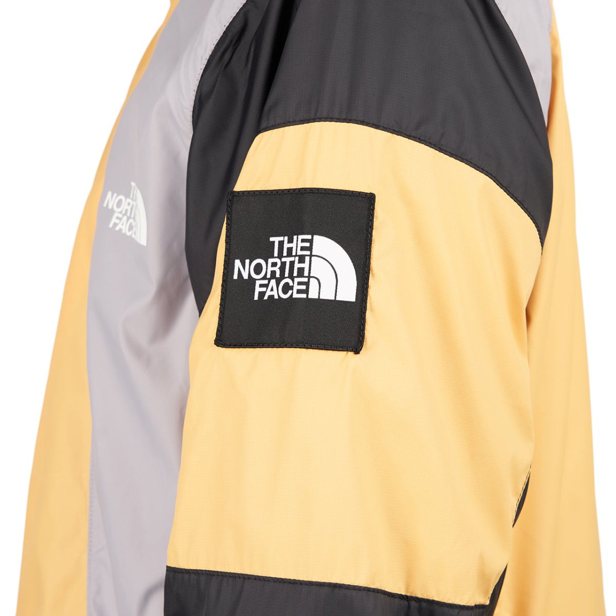 The North Face Phlego Wind Jacket (Orange / Grau)  - Allike Store