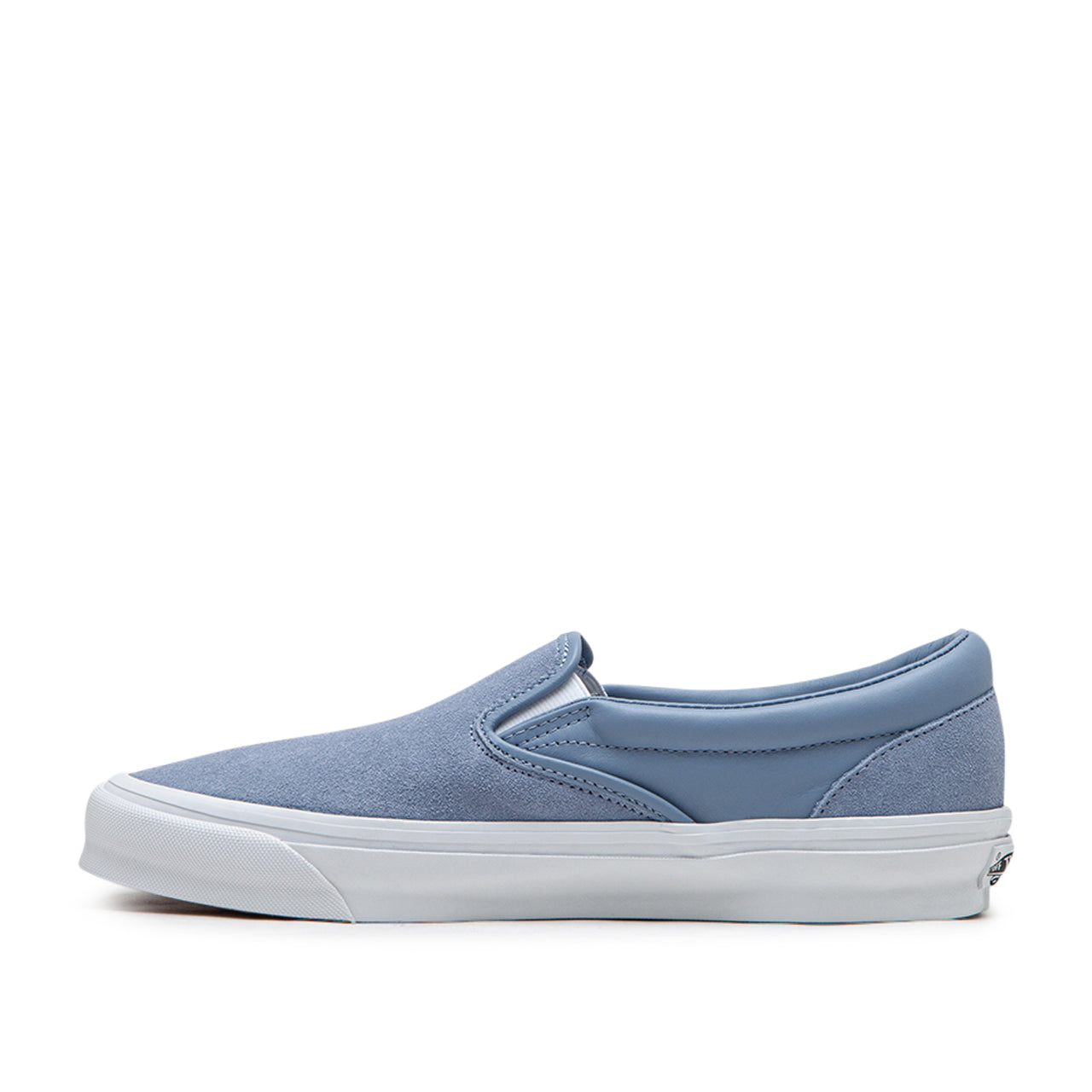 Light gray shop vans slip on