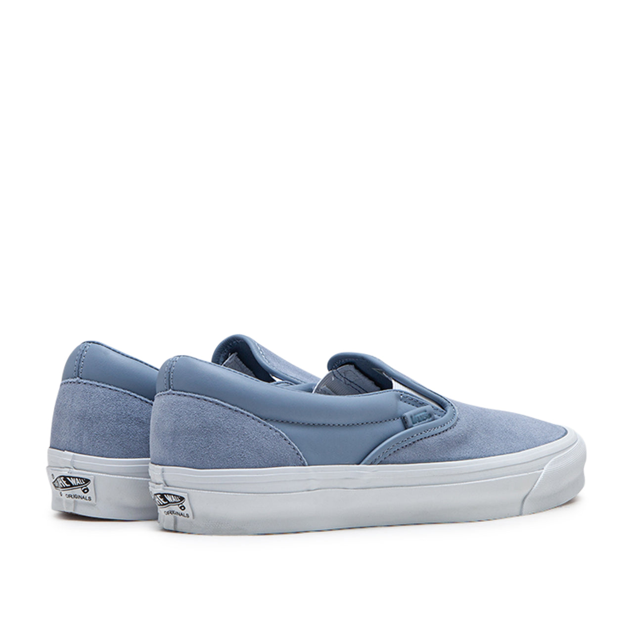 Vans light 2024 blue slip on