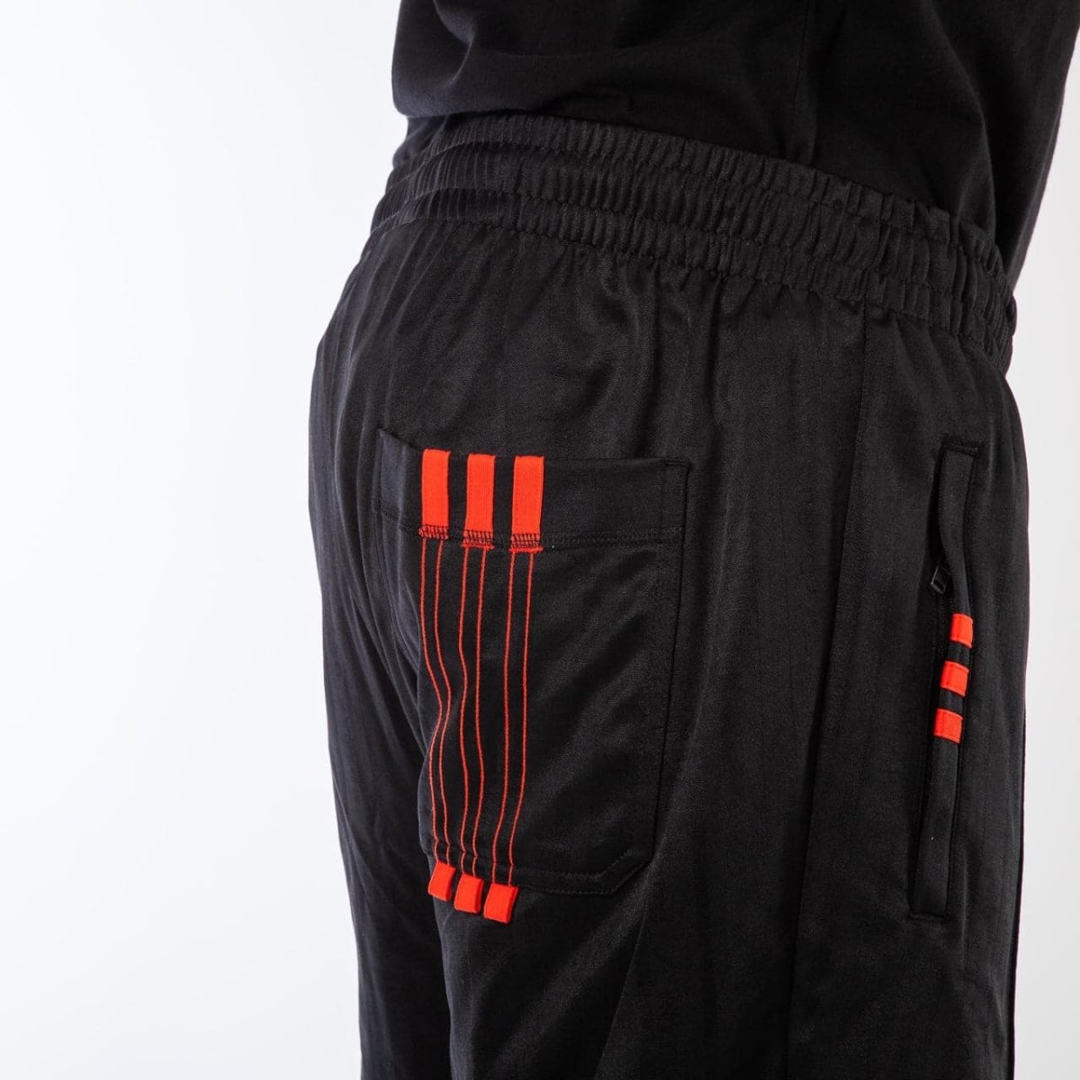 Black and red tracksuit bottoms online