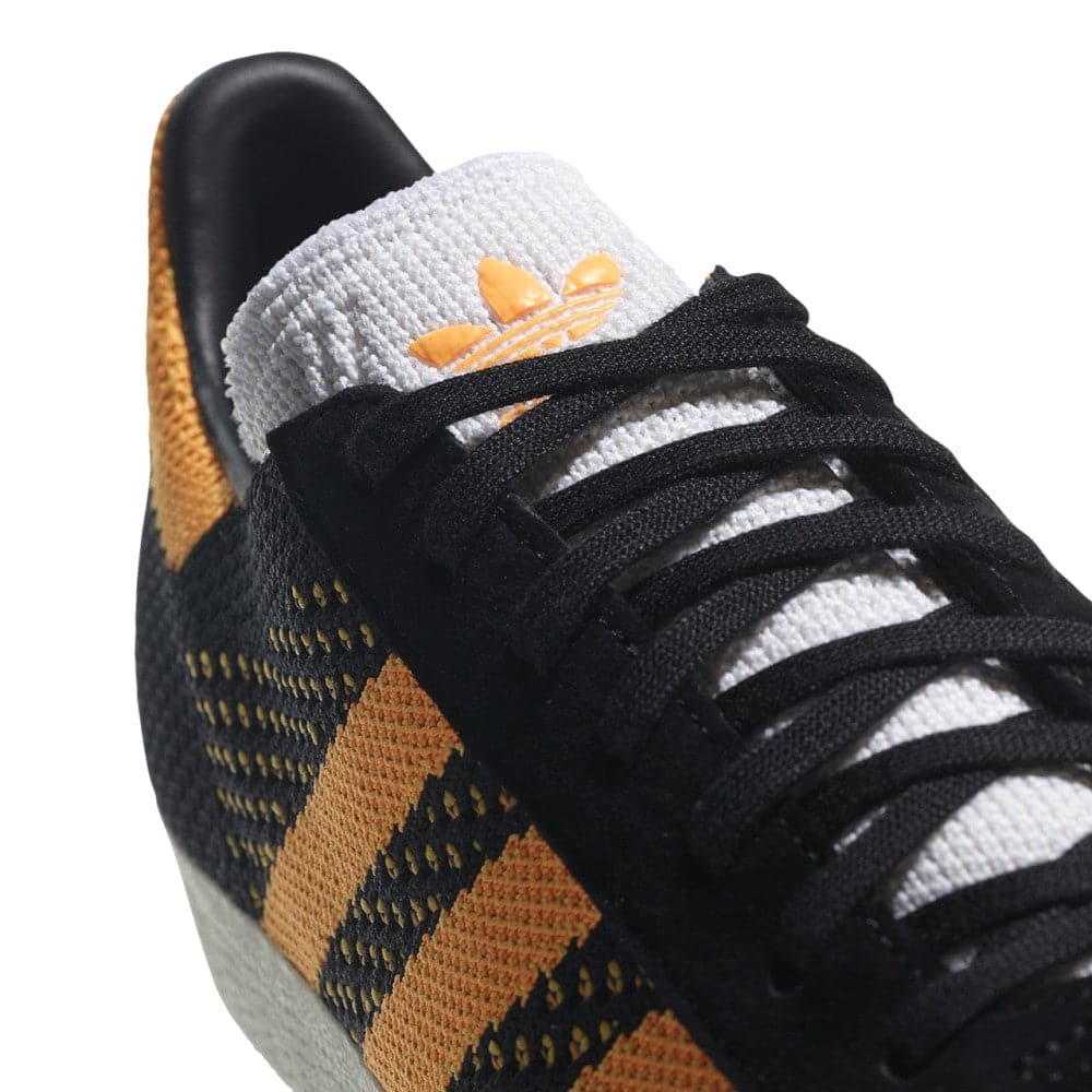 Adidas schuhe schwarz goldene sohle online