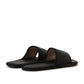 Raised by Wolves Manitobah Mukluks Leather Slides (Schwarz)  - Allike Store