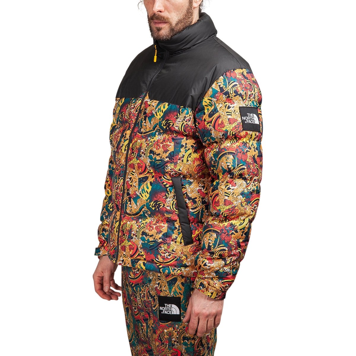 The north face 1992 nuptse jacket on sale leopard yellow genesis