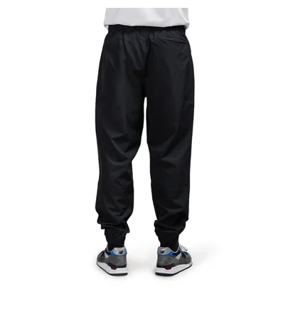 New Balance Athletics Windbreaker Pant (Schwarz)