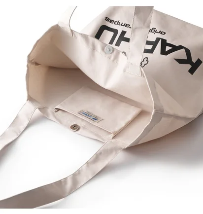 Karhu Trampas Bear Totebag (Hellbeige / Schwarz)