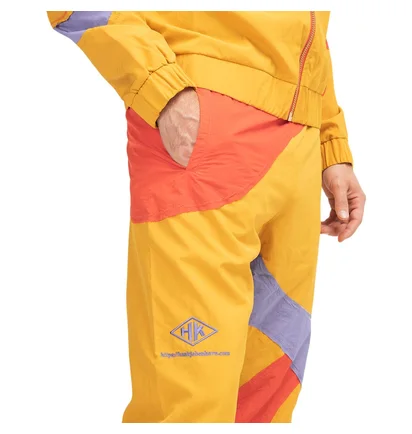 Han Kjobenhavn Track Curve Pants (Orange / Rot / Lila)
